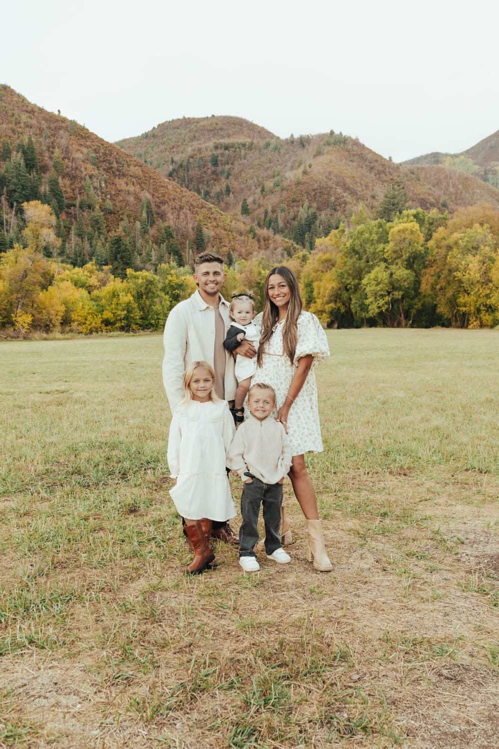 Hayden Bird with his wife and kids in a Utah mountain meadow