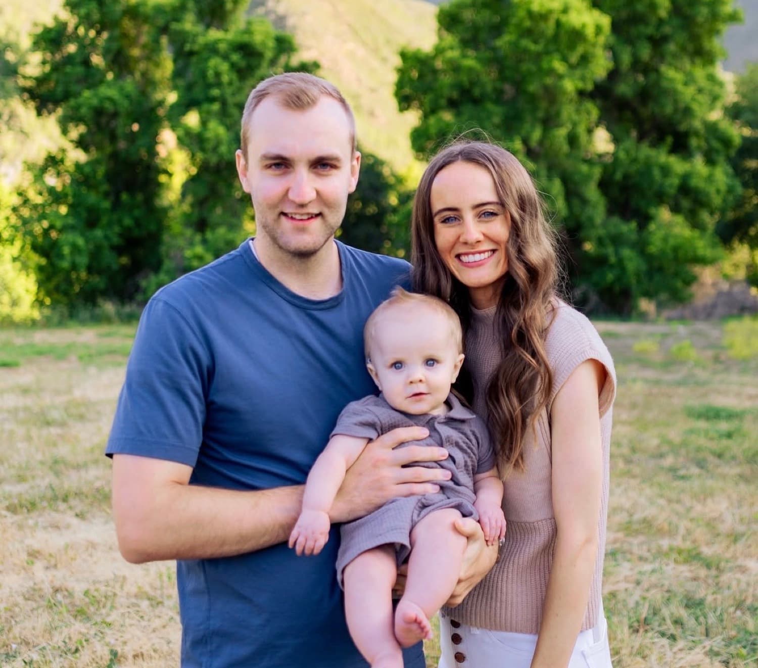 Ryan Hales with his wife and son outdoors in Utah